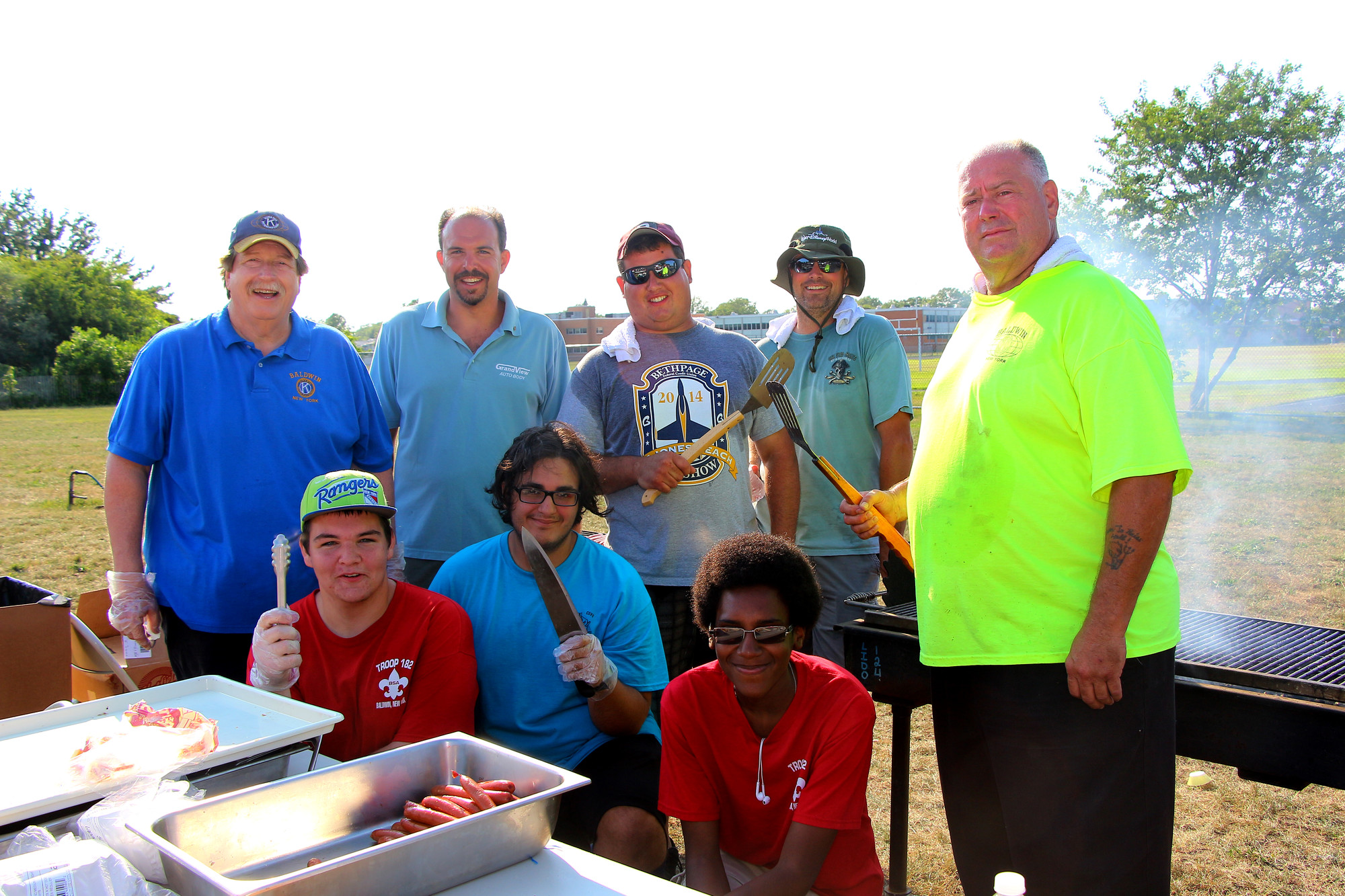 Volunteers served up more than 1,800 hot dogs and hamburgers during the Baldwin Chamber of Commerce Picnic in Baldwin Park. Back row from left were Tony Tarantino, Paul Lizio, Peter Ortiz, Bret Rose and Ralph Rose. From row from left were Brandon Louis, Gabriel Turnan and Kevin Meyers.