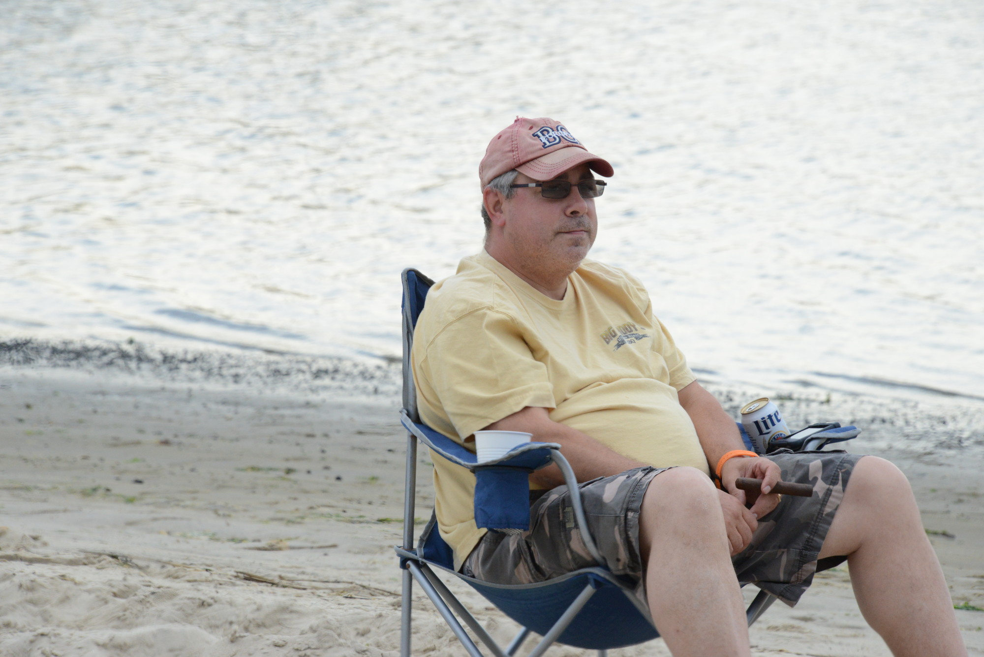 Rich Comuniello, owner of East Coast Roast Coffee, enjoys the sand and the sea at Masone Beach.