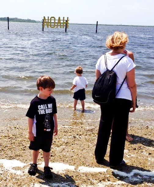A sign honoring the youngest Sandy Hook victim sits in the bay off East Boulevard.