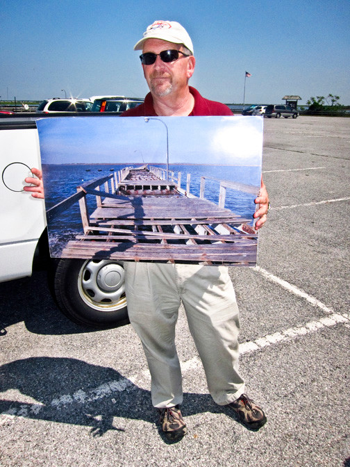 Jones Beach Director of Operations Hank Leggio showed a photo of a bayside pier after Sandy struck.