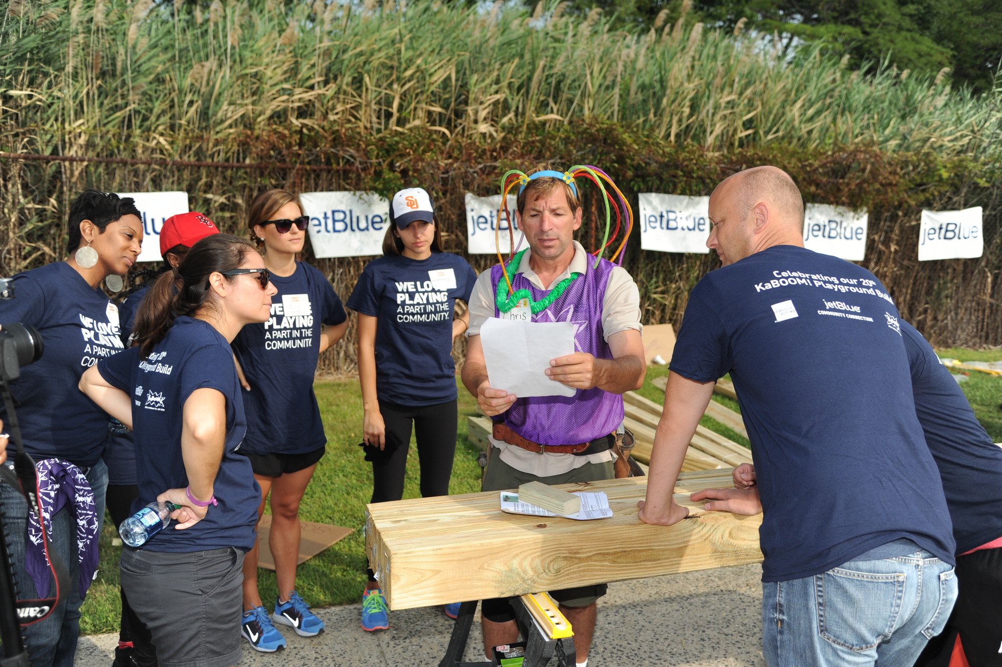 Chris Horvath of Island Park instructed a team of volunteers.