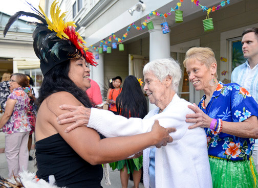 Olivia Manalani taught Caroline and Marge Vesper a traditional hula dance during the event.
