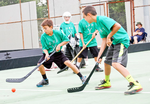 Players from Seaman’s Neck squared off against a team from Veterans Memorial Park in East Meadow during the 21st annual street hockey tournament.