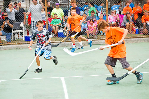 Forest City Park, in orange, competed in the street hockey tournament.