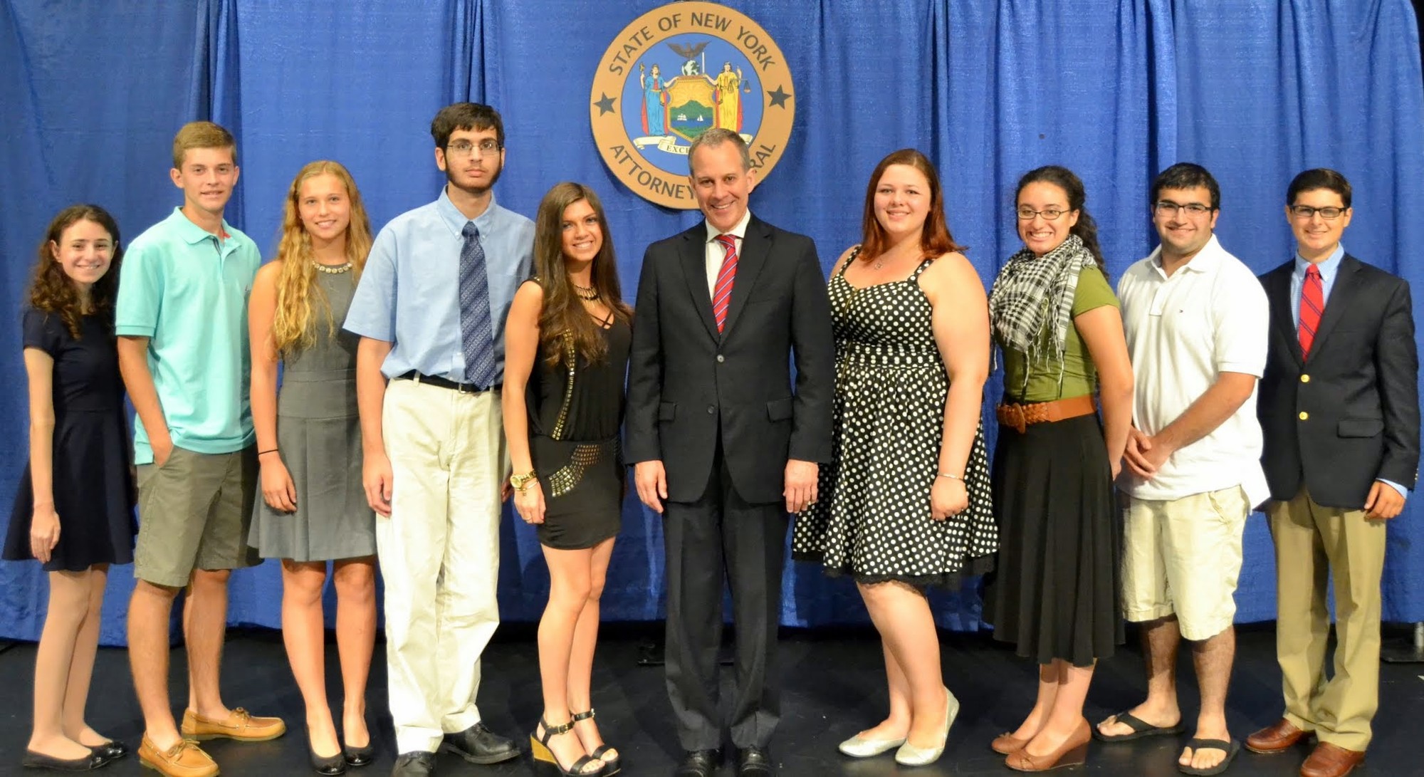 Lindsey Fowler, pictured to the left of New York State Attorney General Eric Schneiderman, was Mepham High School’s Triple C Award winner in 2014.