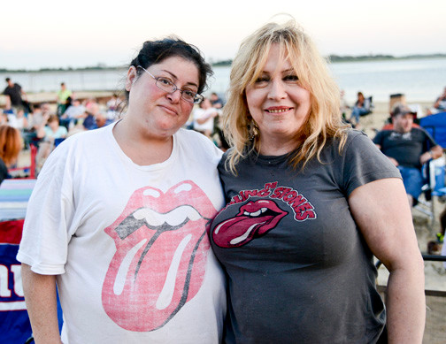 Rolling Stone fans Nina Maltese and Eileen Domingo wore their “Sticky Fingers” T-shirts to the concert on the beach.