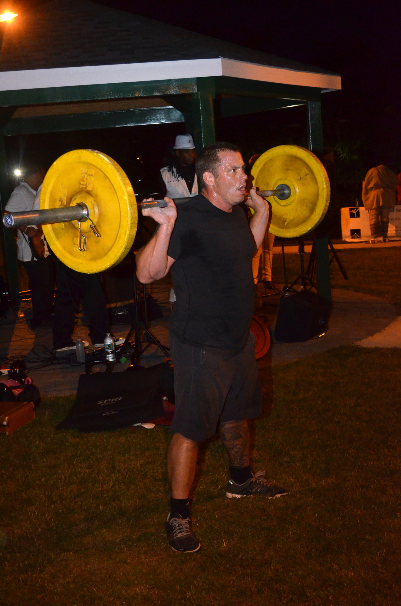 Jimmy Drakopoulos lifting weights at the event.
