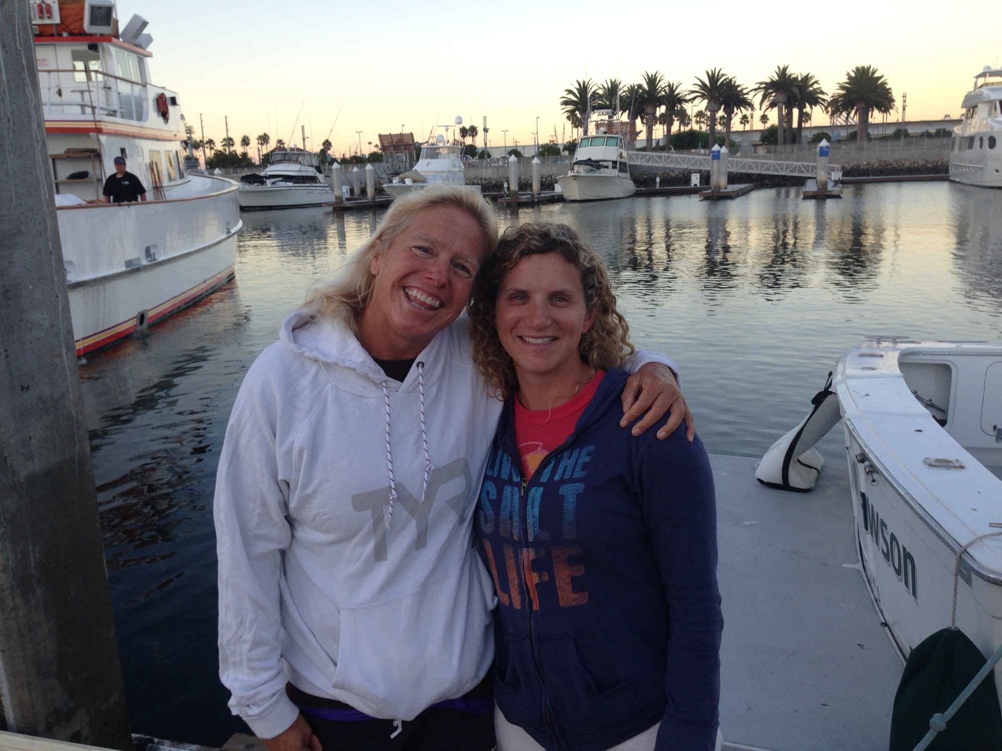 Tina Neill from the Catalina Channel Swimming Federation, left, and Lori King, who swam across the channel.