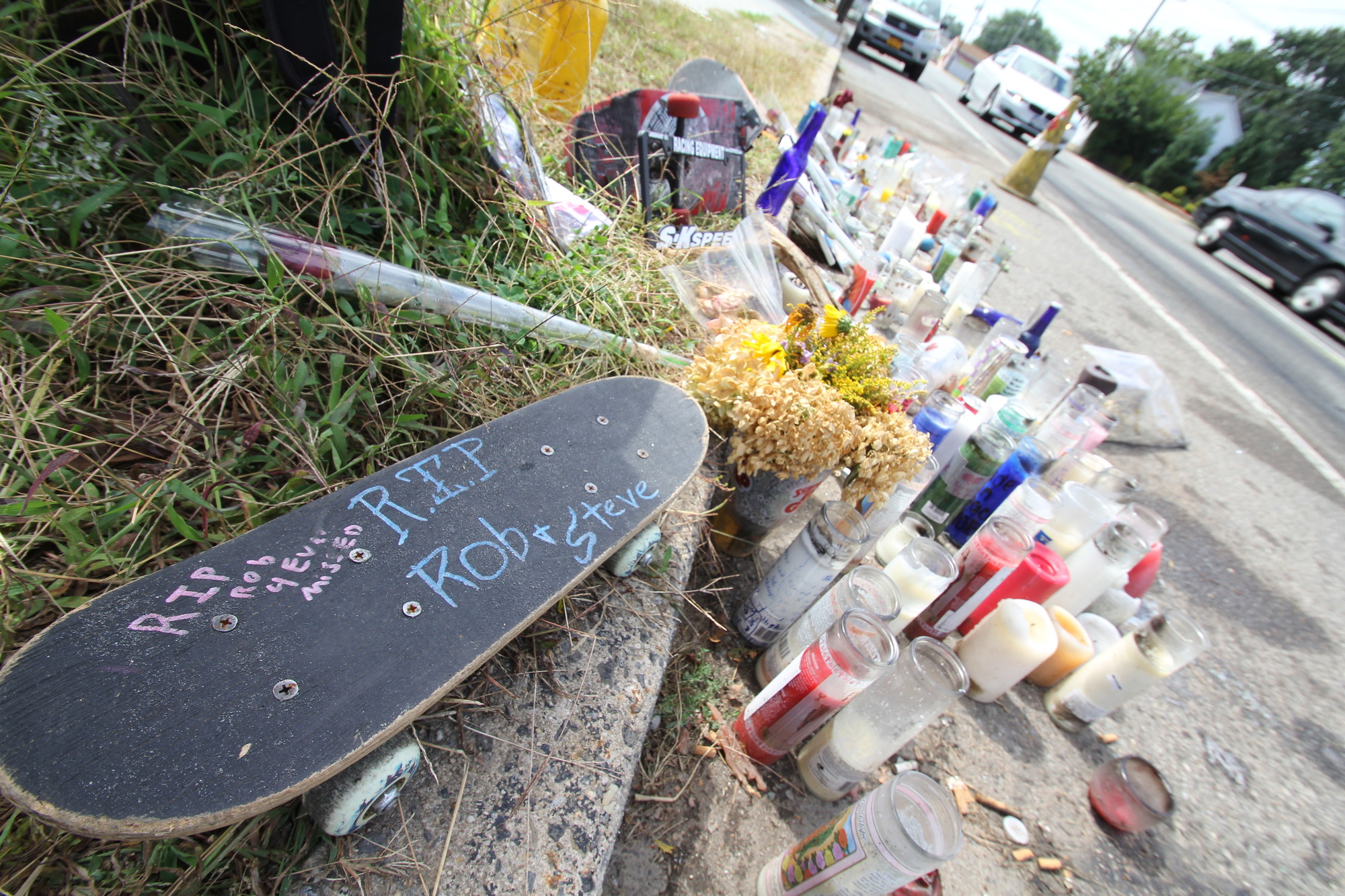 Scores of items have been placed on North Jerusalem Road, near Roxboro Court, in memory of Robert Treimanis, 19, and Stephen Clark, 20, who died last week.