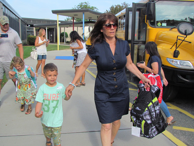 Board of Education Trustee Maryanne Kelly walked youngsters into the building.