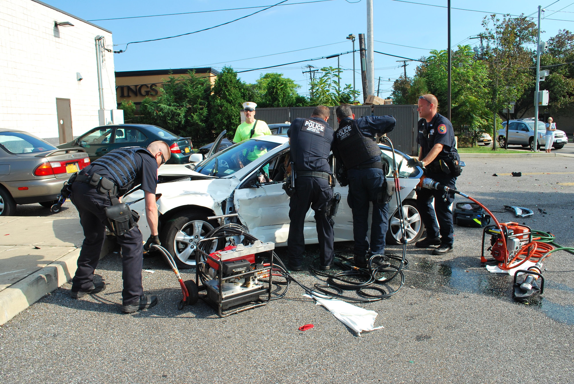 Bellmore Fire Department volunteers and Nassau County police responded to a four-car accident last week that left two drivers trapped in their cars.