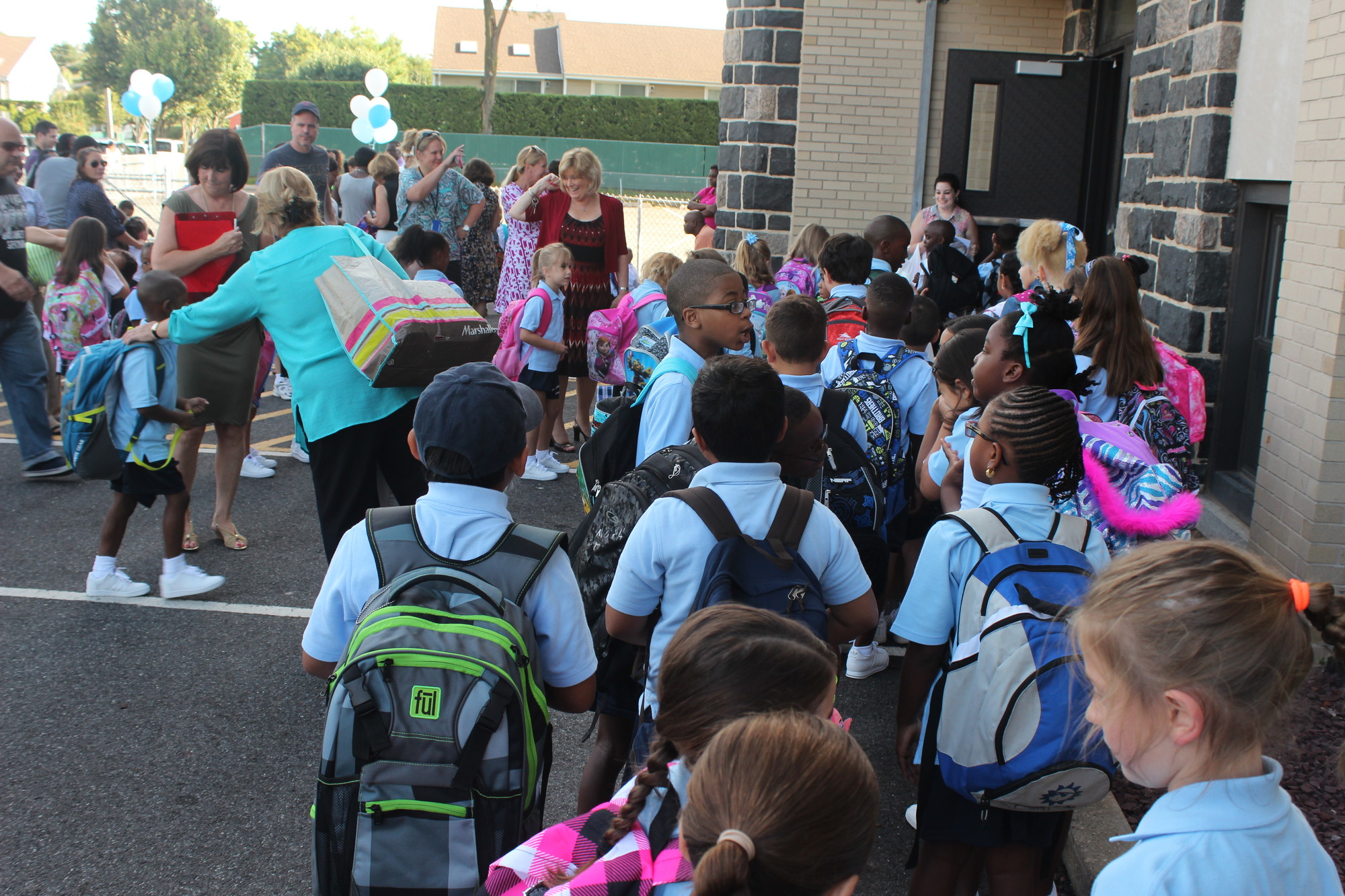 Students were excited to go in for their first day of school at St. Christopher School.