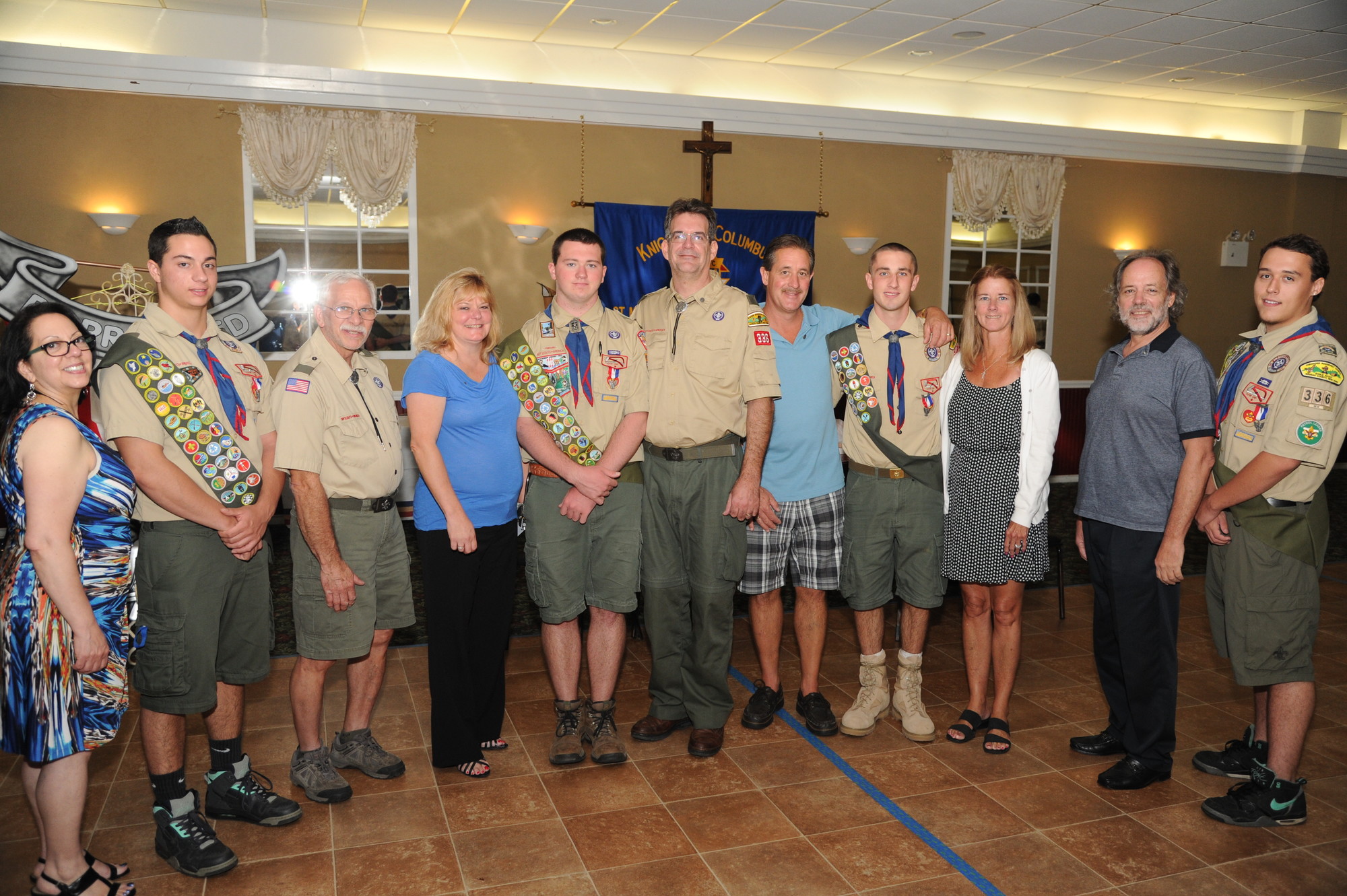 Family members congratulated the Eagle Scouts after the ceremony at the Lynbrook Knights of Columbus