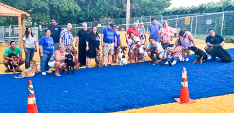 Members of Friends of Valley Stream Dogs gather for a photo at the run