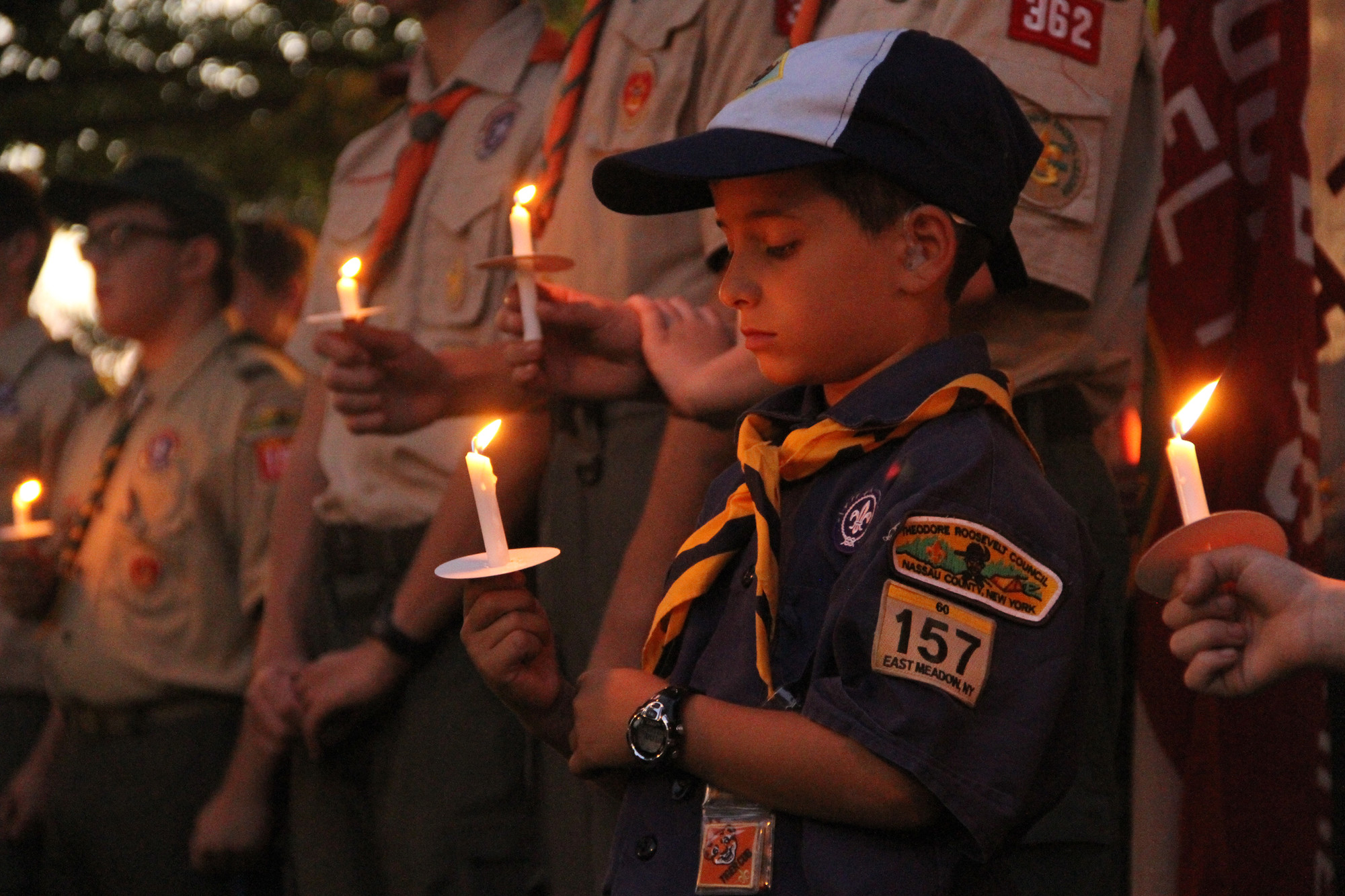 Aaron Schlectman of East Meadow Boy Scout Troop 157  stood solemnly at the community Sept. 11 ceremony.