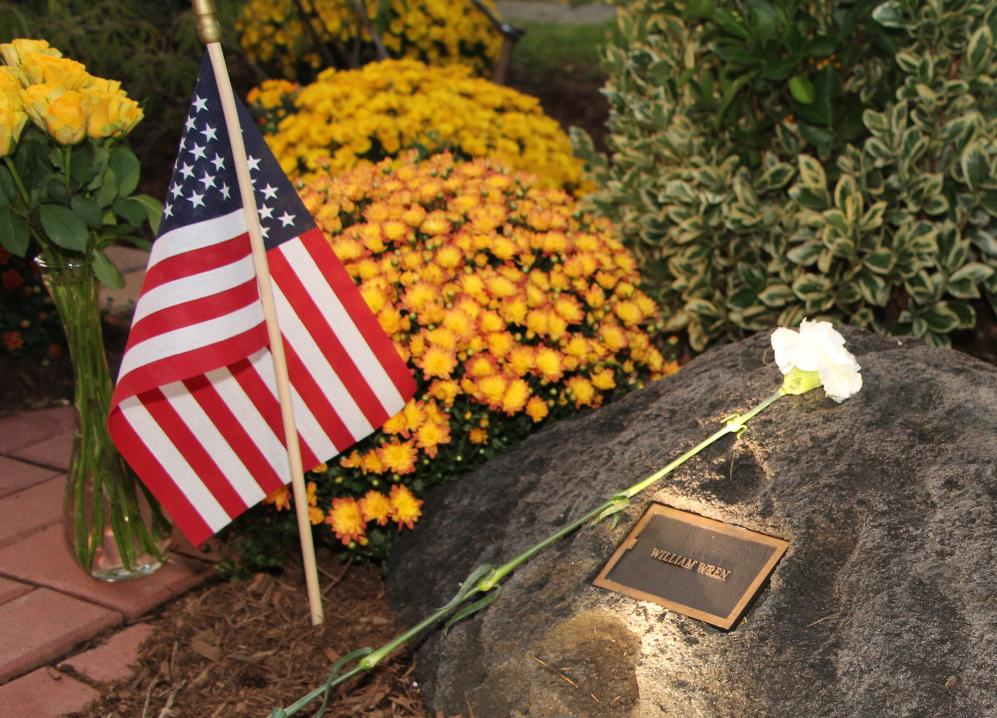 Flowers were laid down for the members in remembrance of  Lynbrook community members who were lost on 9/11.