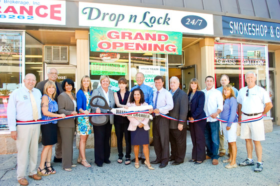 Drop n Lock on Railroad Avenue in Wantagh, owner by Laurie Erb, seventh from left, celebrated its grand opening on Sept. 12 with a ribbon-cutting ceremony hosted by the Chamber of Commerce.