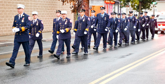 Chiefs, officers and firefighters from Seaford marched down Wantagh Ave.