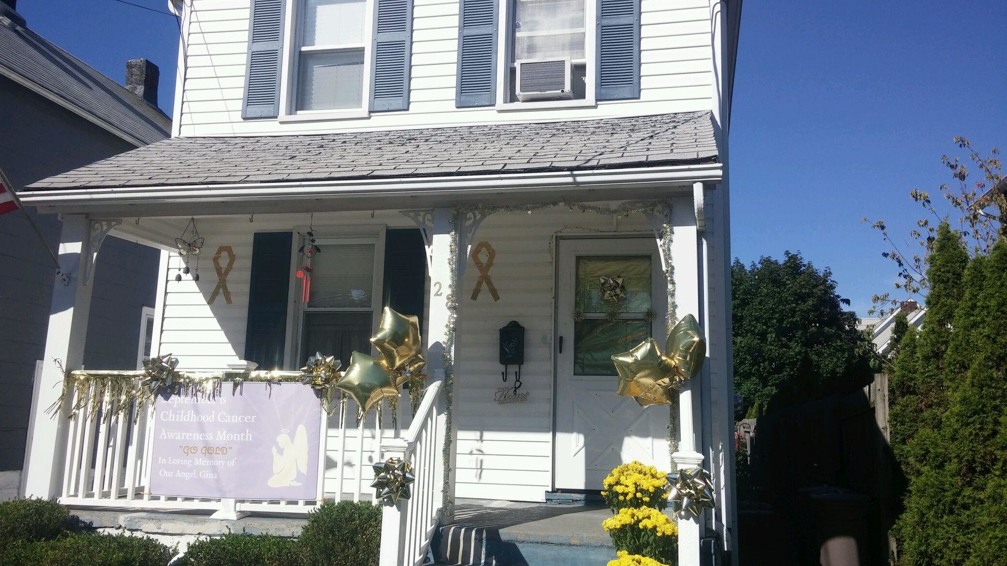 The Giallombardos decorated their Rockville Centre home in gold for the month of September in honor of Childhood Cancer Awareness Month.