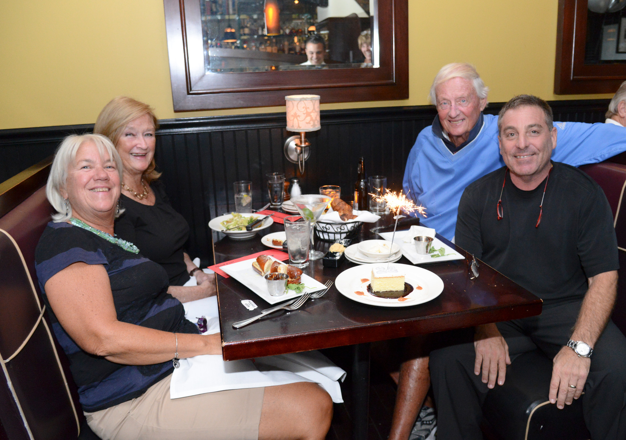 George Martin Restaurant celebrated its 25th anniversary with longtime original patrons MaryAnn Hanson, Bernadette and Dan Morrissey, along with owner George Korten and a sparkle cake.