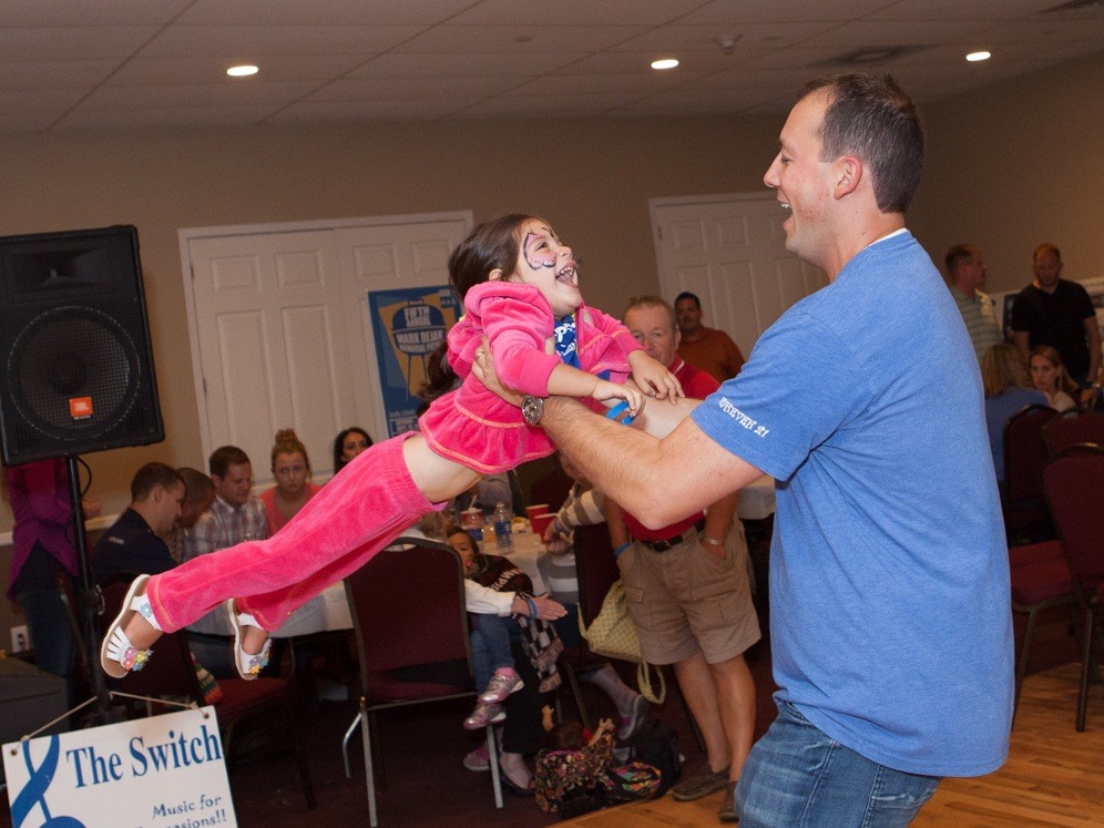 Greg Dejak spun his daughter, Madelyn, around on the dance floor.