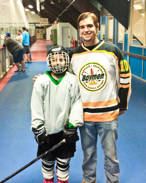 far left, with Ryan Gibbons of the Wantagh-Seaford Baymen, a hockey club for middle and high school students that also is known for its involvement with the Long Island Blues and other community service activities. Gibbons is a senior at Seaford High School.