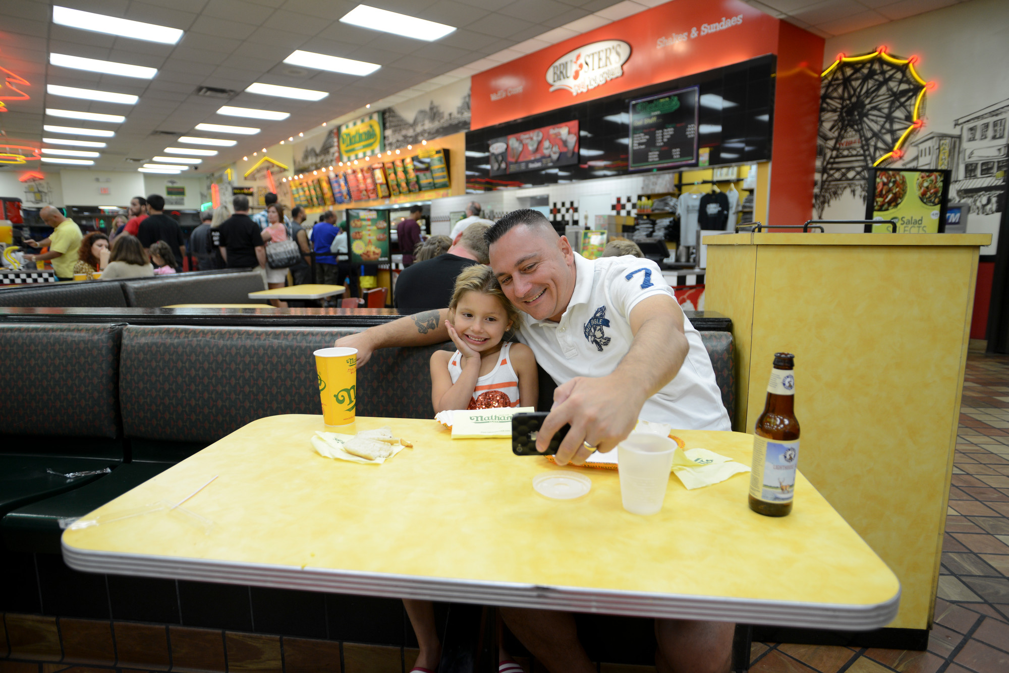 Ava and Frank Morizio took a selfie as they enjoyed their last taste of Nathan’s.