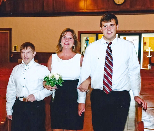 Karen Siler with her late brother, Michael Russell, left, and her son, Ryan.