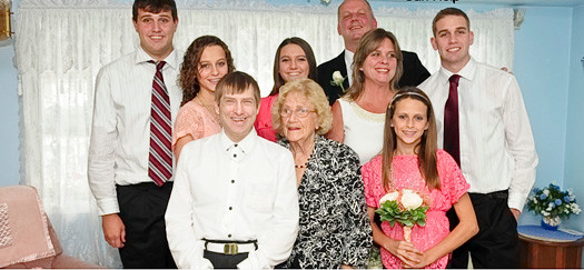 Karen Siler, middle row, second from right, created Karen’s Hope to support individuals with developmental disabilities seeking a sense of independence. Her inspiration includes her son, Ryan, far left, who has autism, and her late brother, Michael Russell, front row at left, who had Down syndrome.