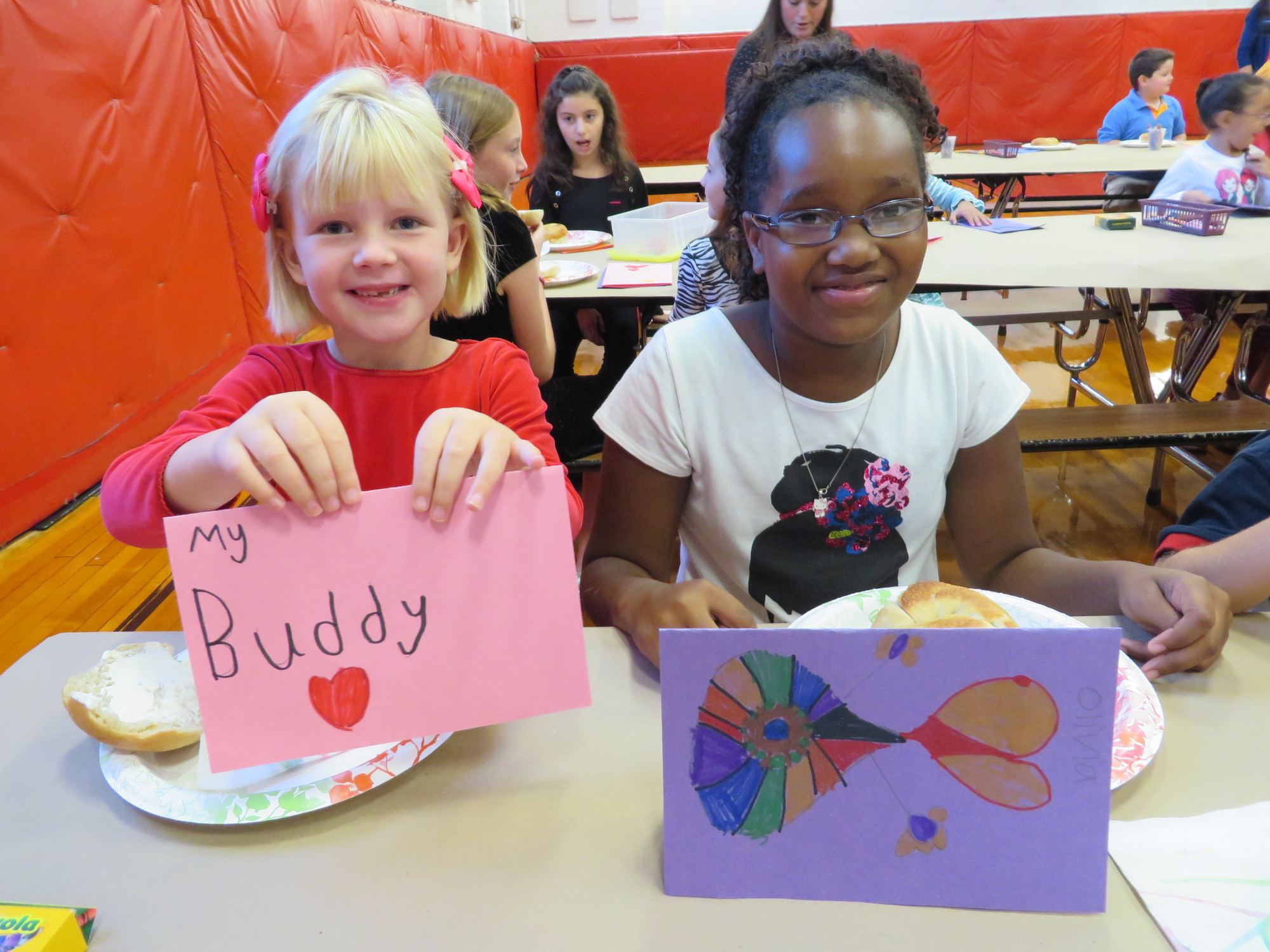 Olivia Mulhal and Sarai Hodge showed off the cards they made for each other.