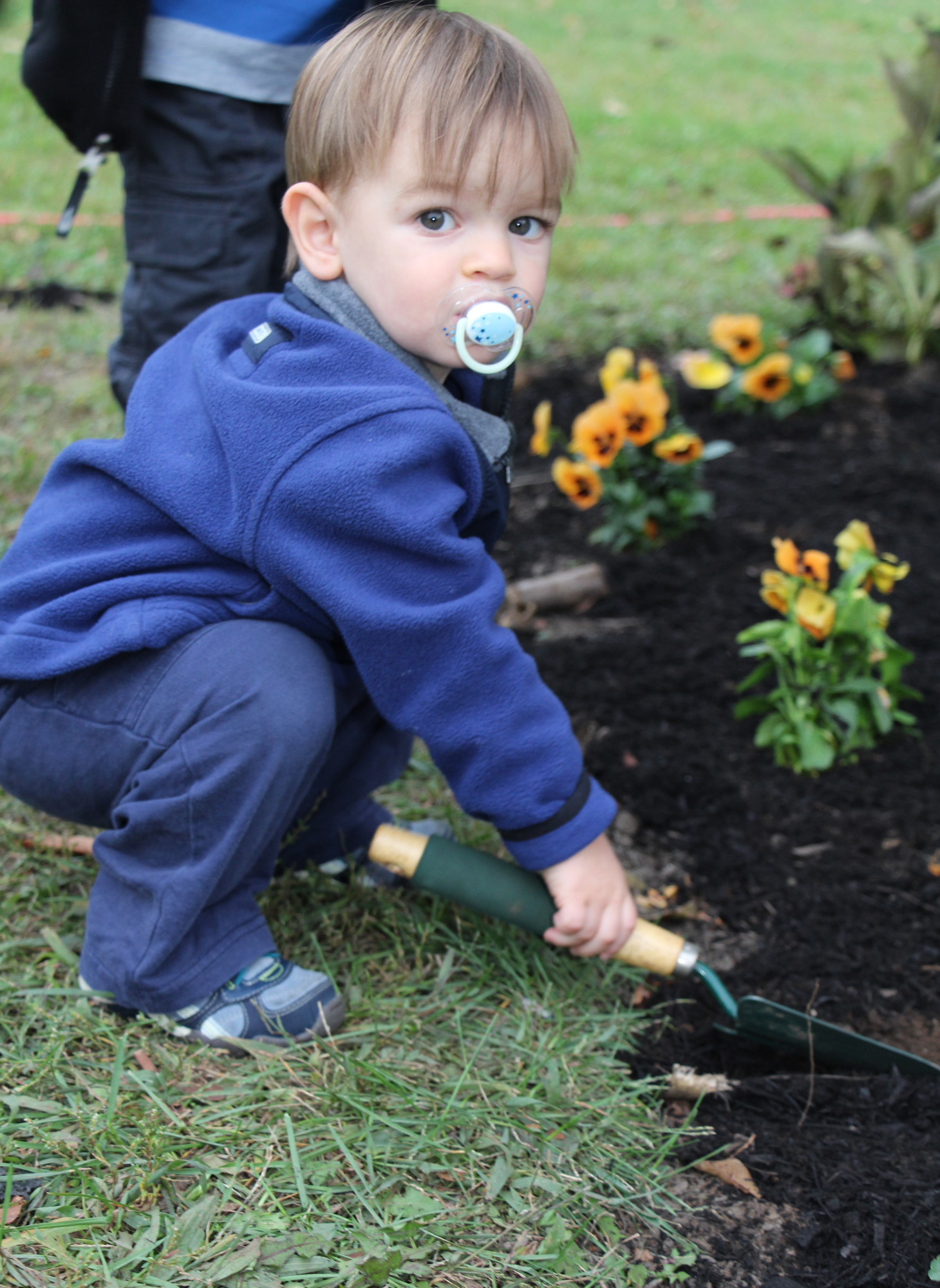 Maceo Barry, 16 months old, had  one of his first gardening experiences, proving you are never to young to lend a helping hand.