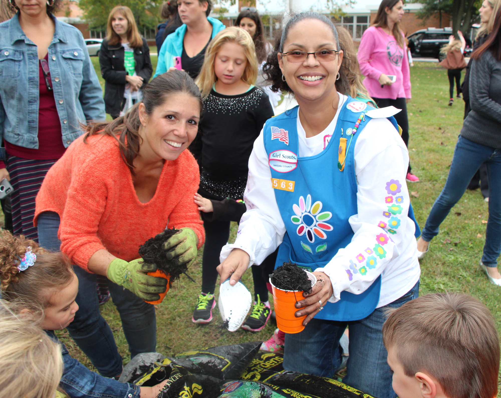 Kim Frank, left, and Vanessa Carlson, members of the Bowling Green Parent Teacher Association, helped organize the anti-bullying and beautification event at Bowling Green.