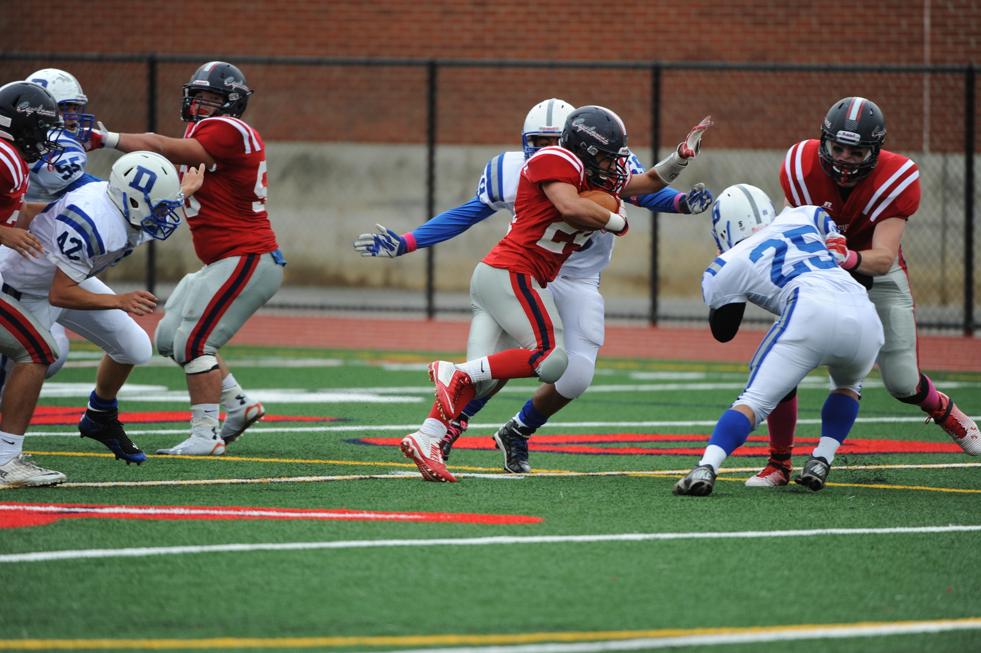 Luke Scaduto tried to break through Division’s defense to score a touchdown for South Side.