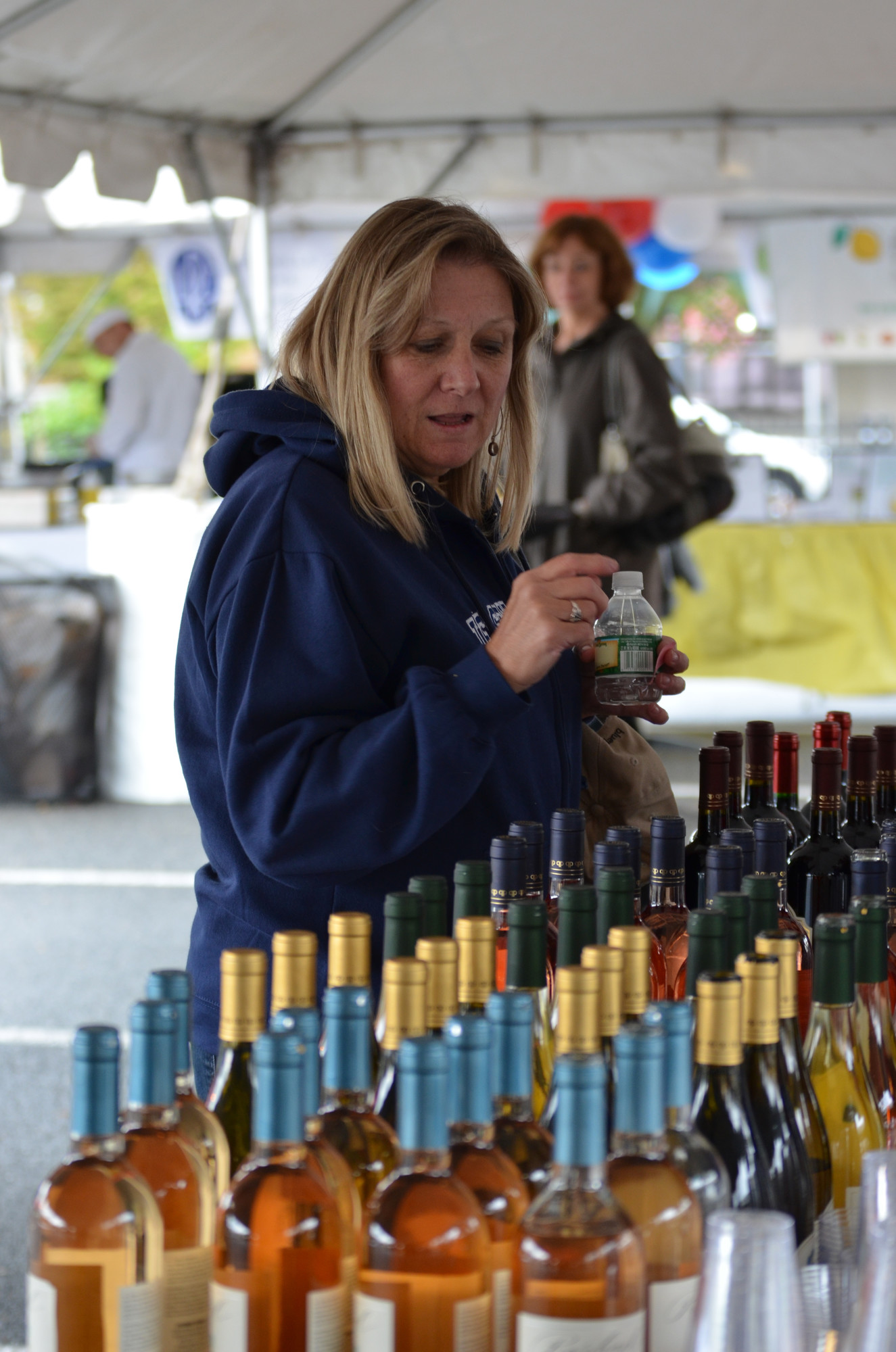 Sue Hill of Rockville Centre tried to decide which wine to try.