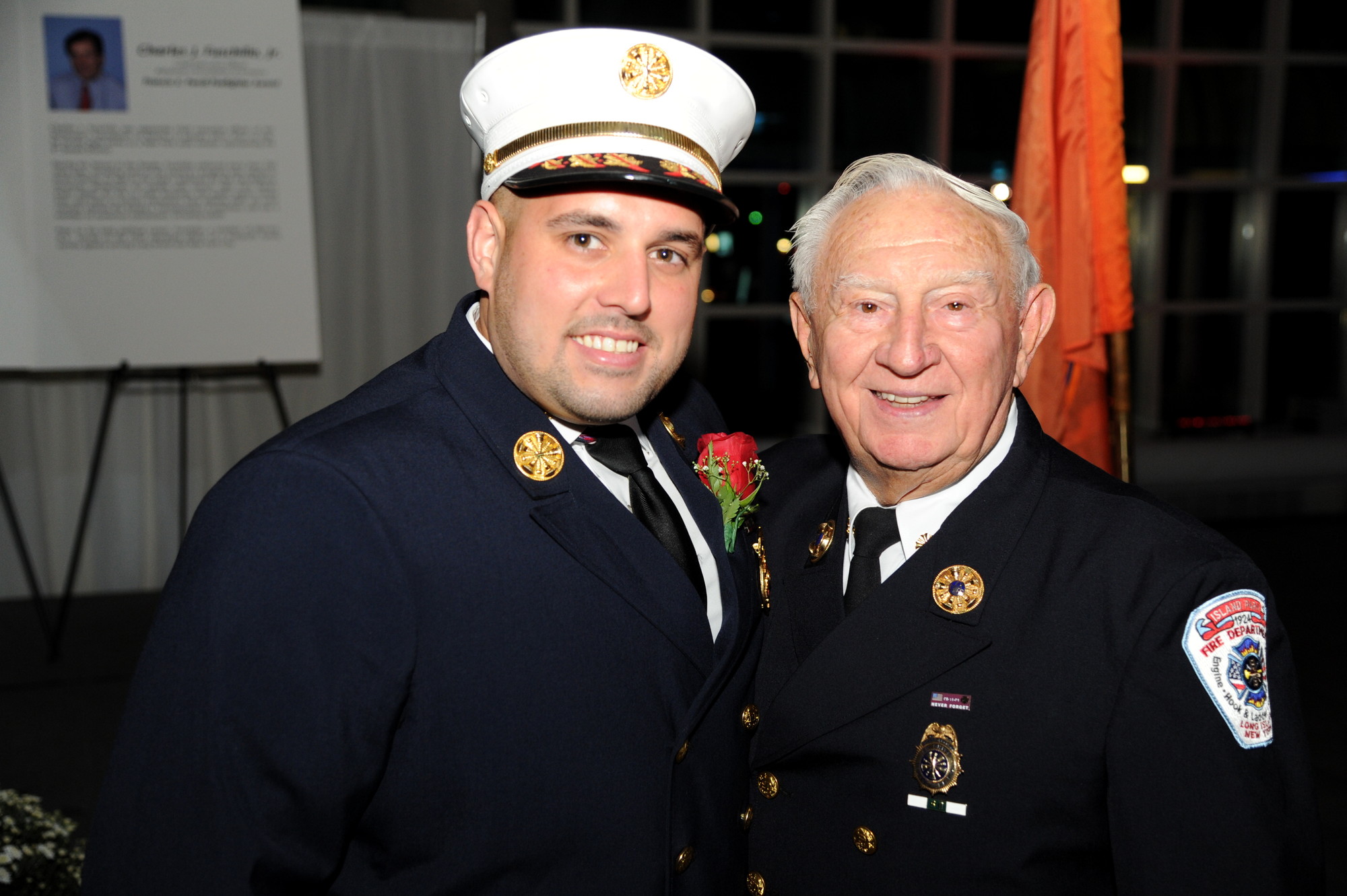 Island Park Fire Chief Anthony D’Esposito, left, with ex-chief Ed McGann, who served in the department for 67 years, at the Nassau County Firefighters Museum and Education Center awards dinner on Oct. 11.