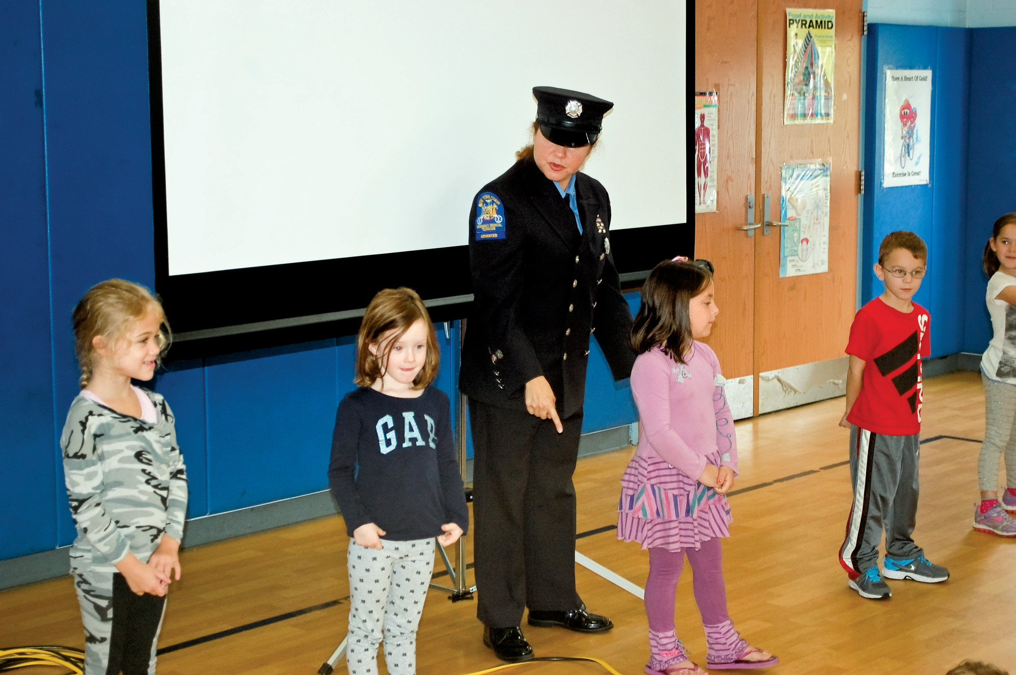 Wantagh Firefighter and instructor Marcela Loeber told children how to stop, drop and roll if their clothes ever caught on fire.