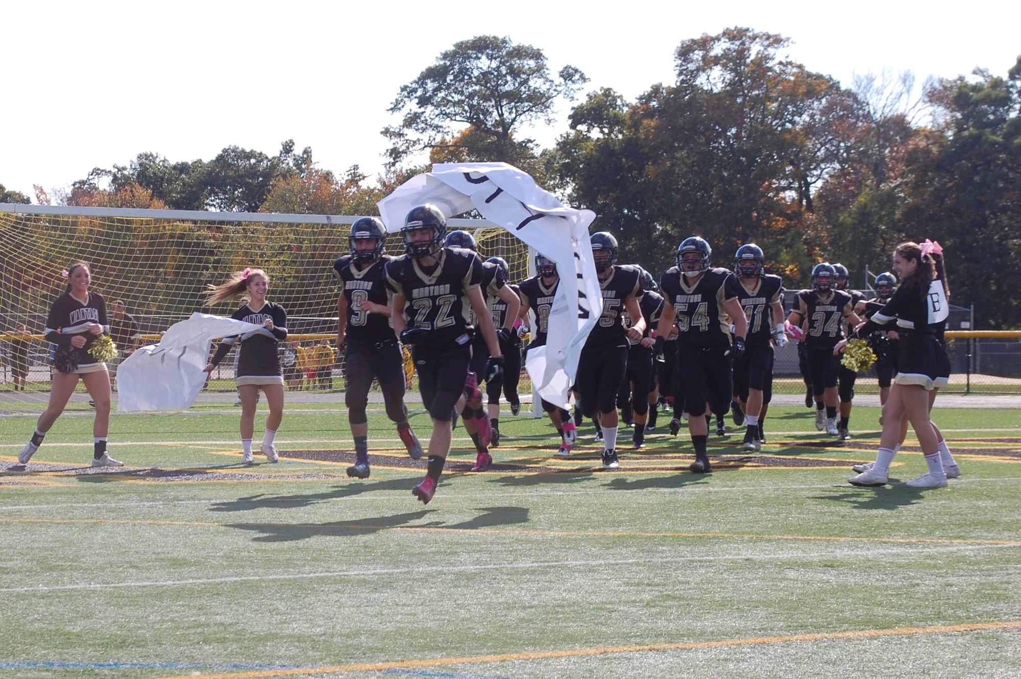 The Wantagh Warriors charged onto the field prior to the Homecoming game on Oct. 18.