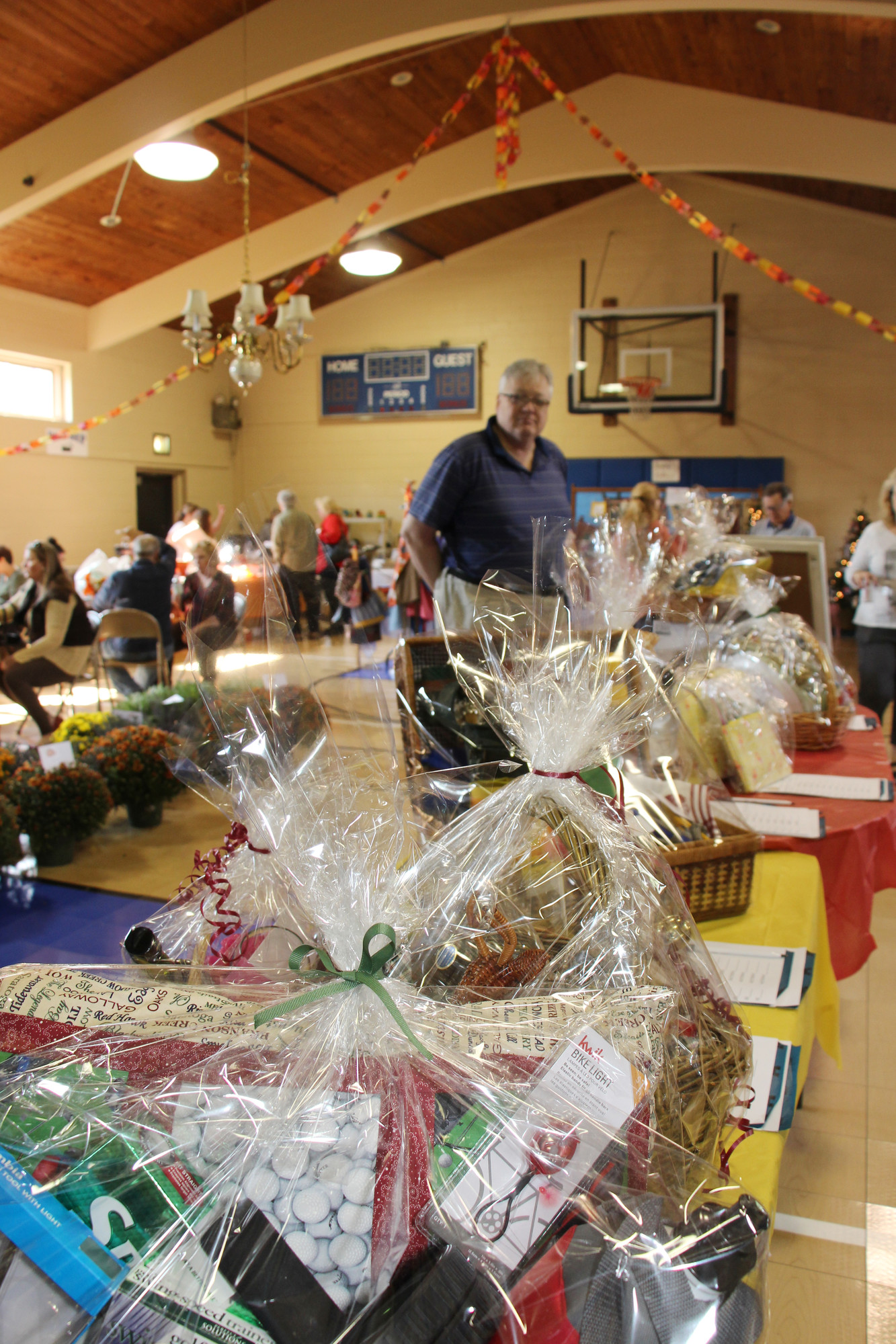 Walter Wagner checked out some of the baskets that were going to auctioned off at St. Peter’s Fall Festival.