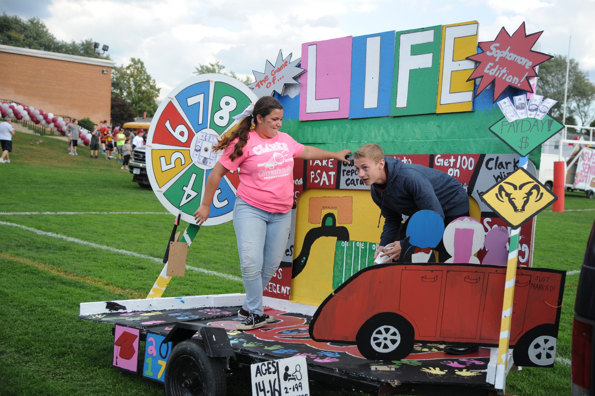 It was a board game theme for Clarke’s student floats at Saturday's Homecoming parade. Above, the sophomore class designed a mobile Game of Life.