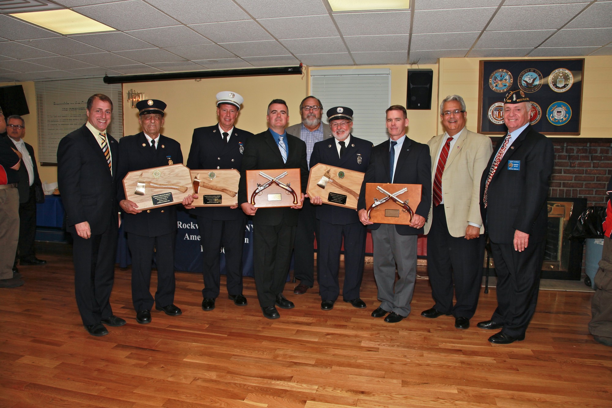 Last month, the American Legion honored Rockville Centre firefighters and police officers for their service to the village. Pictured here, from left, are Assemblyman Brian Curran, Honorary Chief Frank Germano, Fire Captain Thomas Walsh, Police Detective Timothy Seward, Rockville Centre Village Mayor Francis X. Murray, Ex-Captain James Prinzevalli, Police Detective Michael Meehan, Town of Hempstead Councilman Anthony Santino and Legion Post Commander Joe M. Scarola.