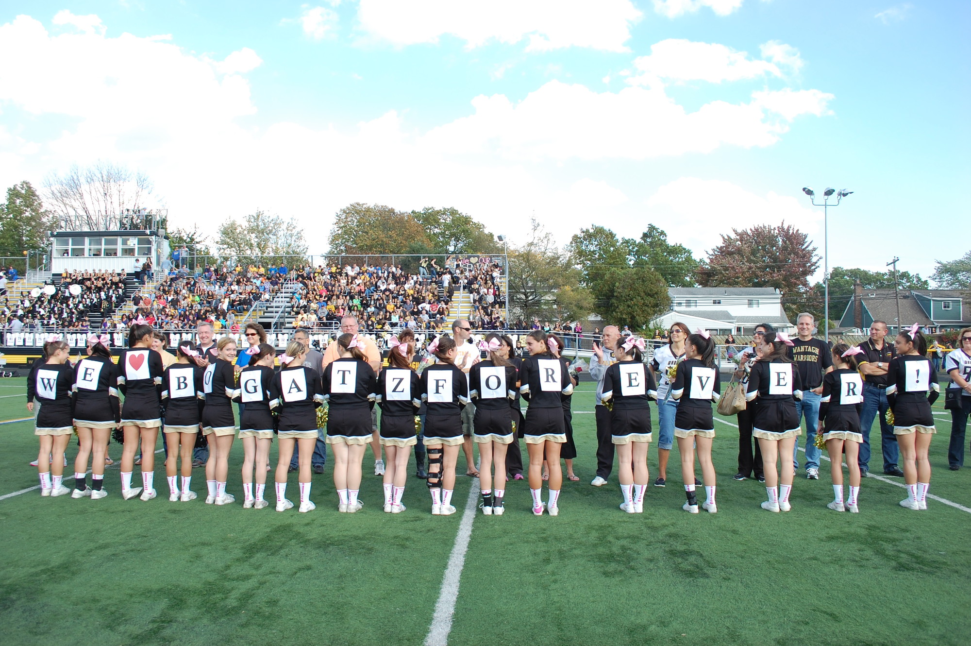 Wantagh High School cheerleaders paid tribute to retiring announcer Bill Bogatz before the Homecoming game on Oct. 18.