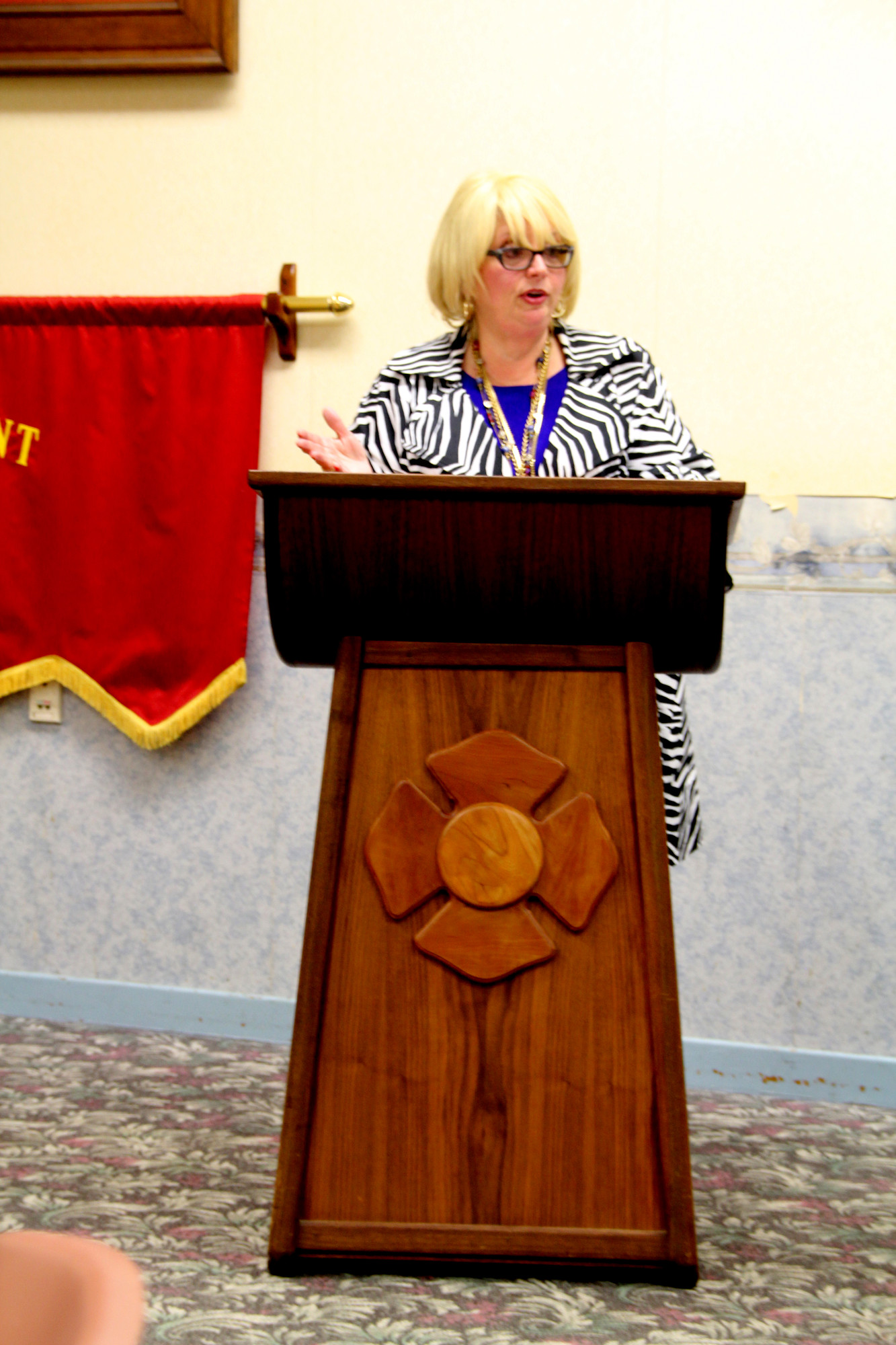 Julie Marchesella, president of the Nassau Council of Chambers, addressed the group.