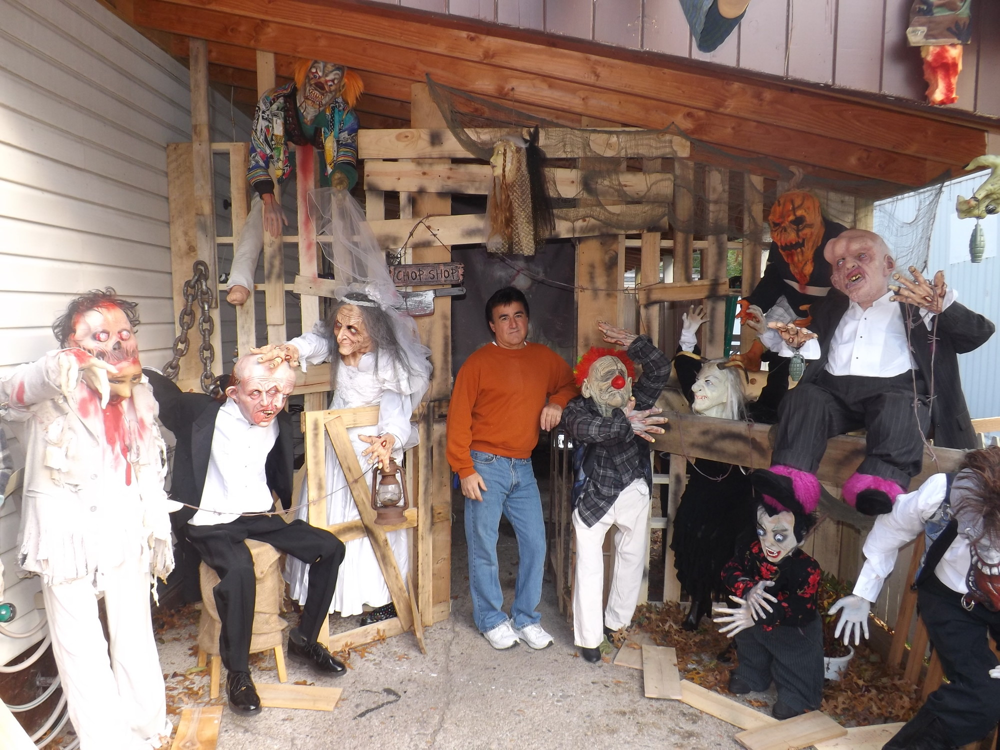 Gilardi, center, takes pride in his work and enjoys enhancing the Halloween experience for the community.