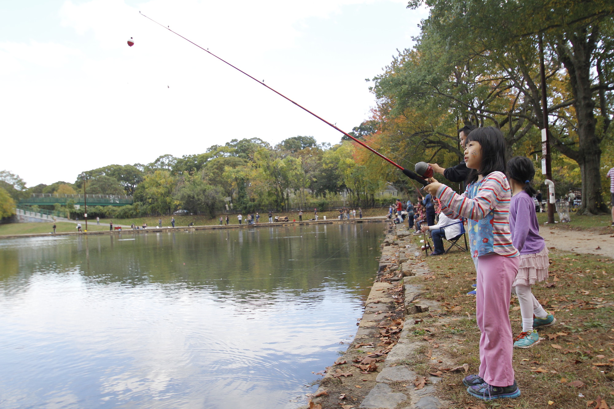 The fishing festival was an opportunity for Kailing Tan to learn how to cast a line.
