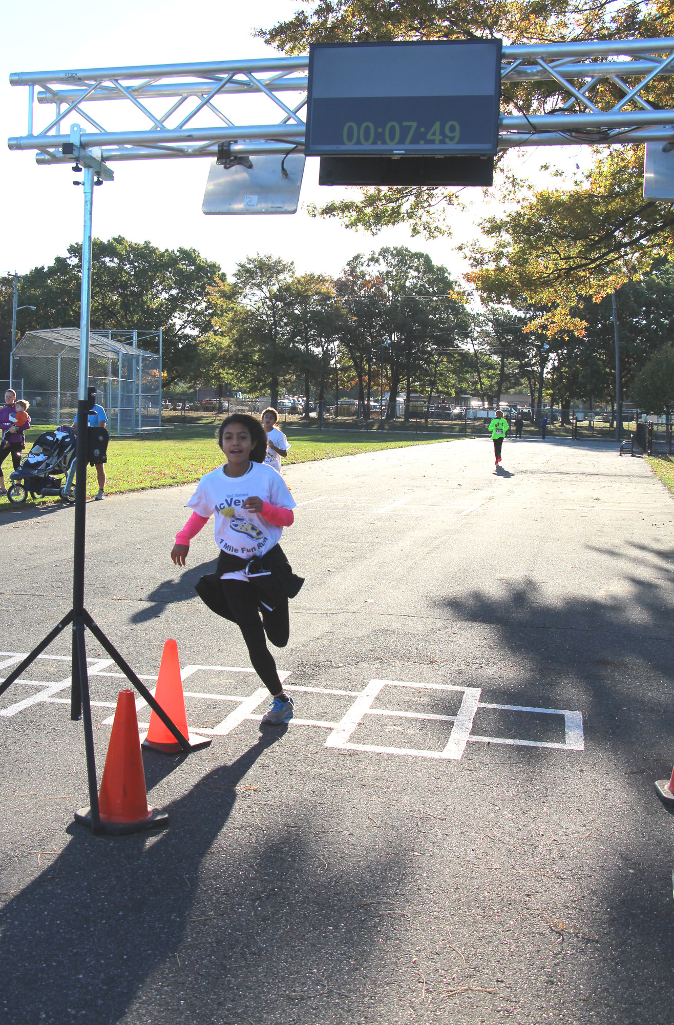 Scarlett Espinoza, 11, the 1-mile fun run winner, clocked in at 7 minutes and 49 seconds.