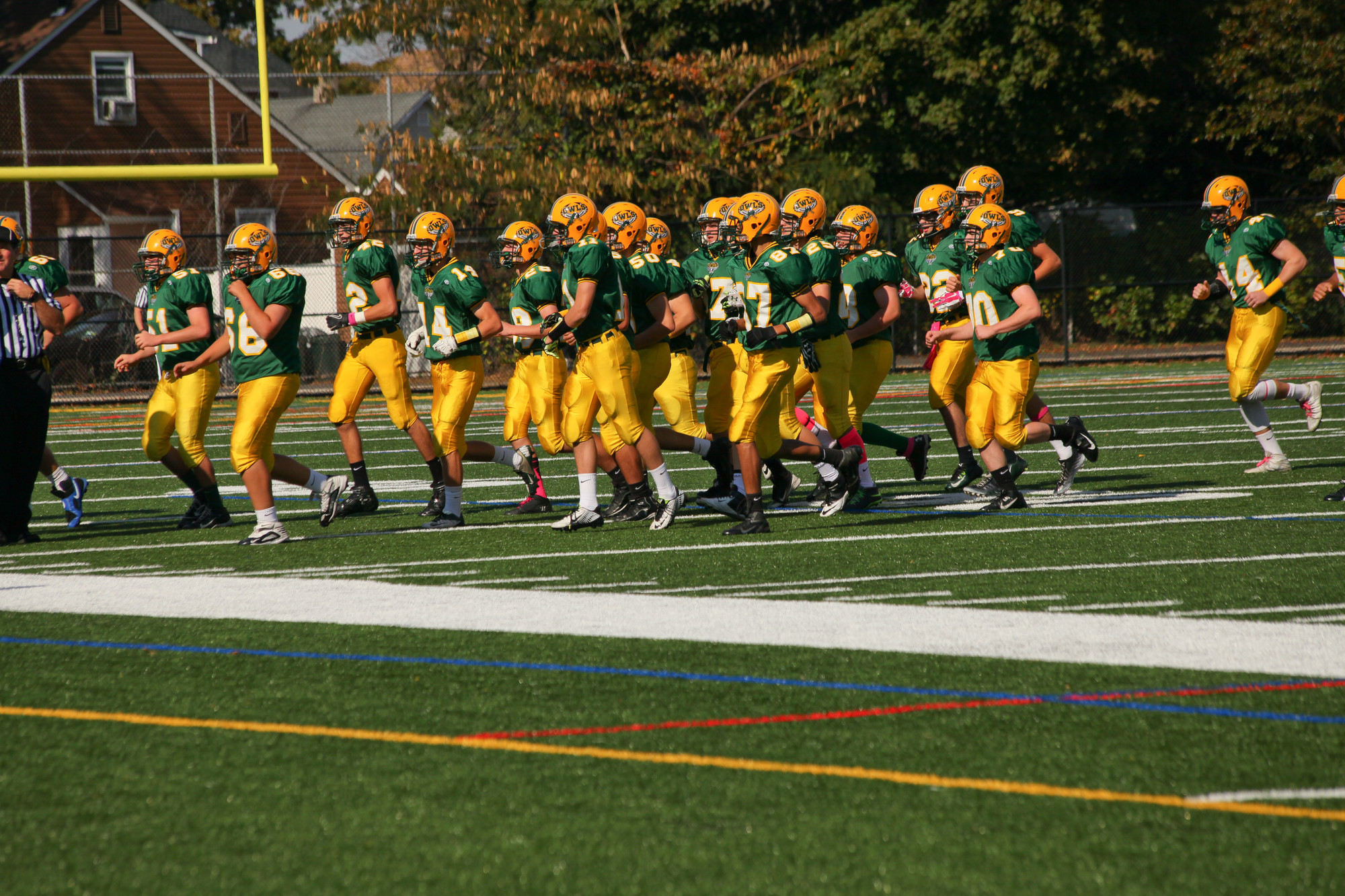 The Lynbrook football players warm up before the start of this years Homecoming football game.