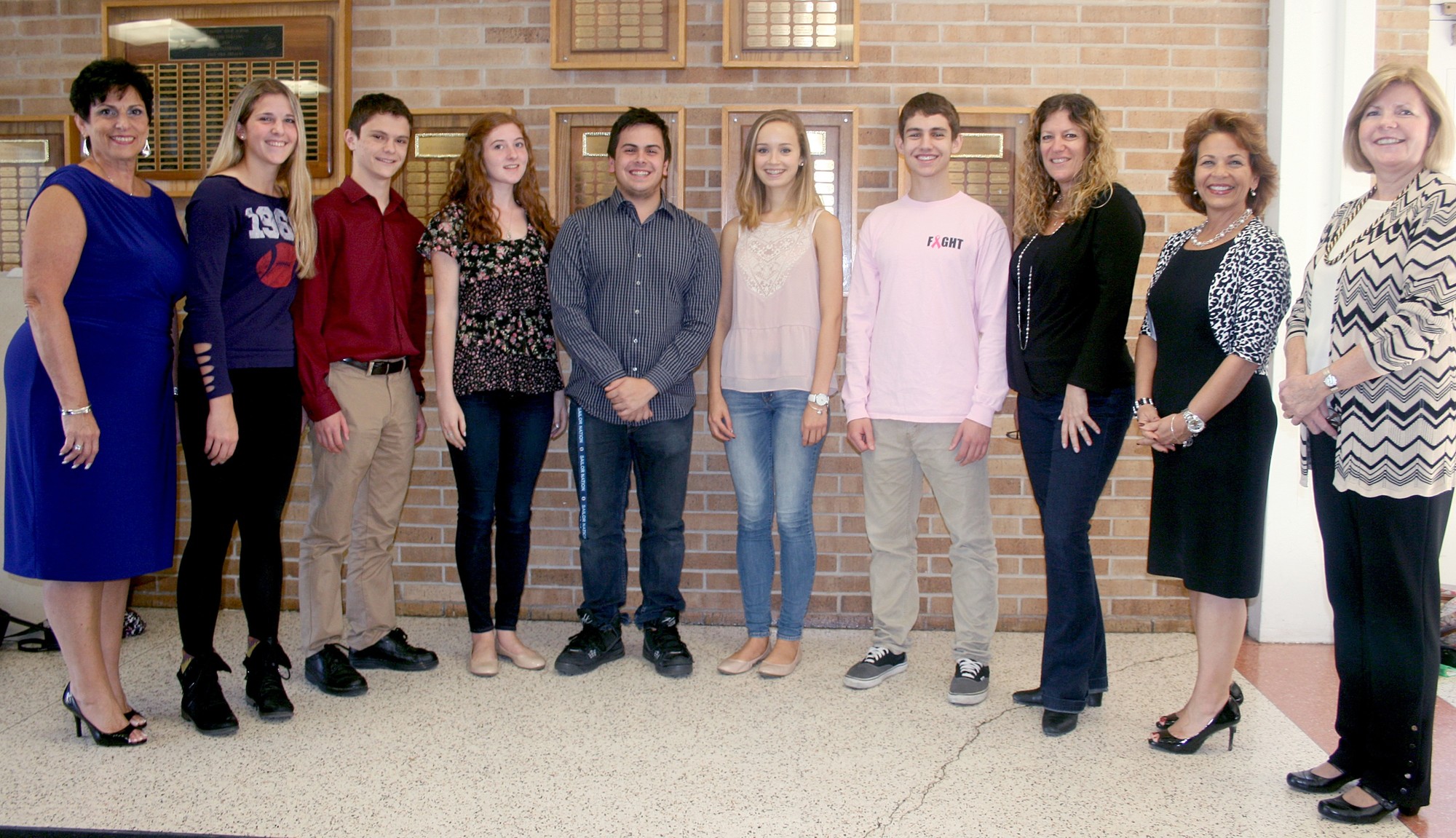 Oceanside’s Five Commended Merit Scholars,with high school principal Geraldine DeCarlo, far left, Mindy Stecklow, third from right, Pat Forie, right, and Superintendent of Schools Dr. Phyllis S. Harrington, second from right.