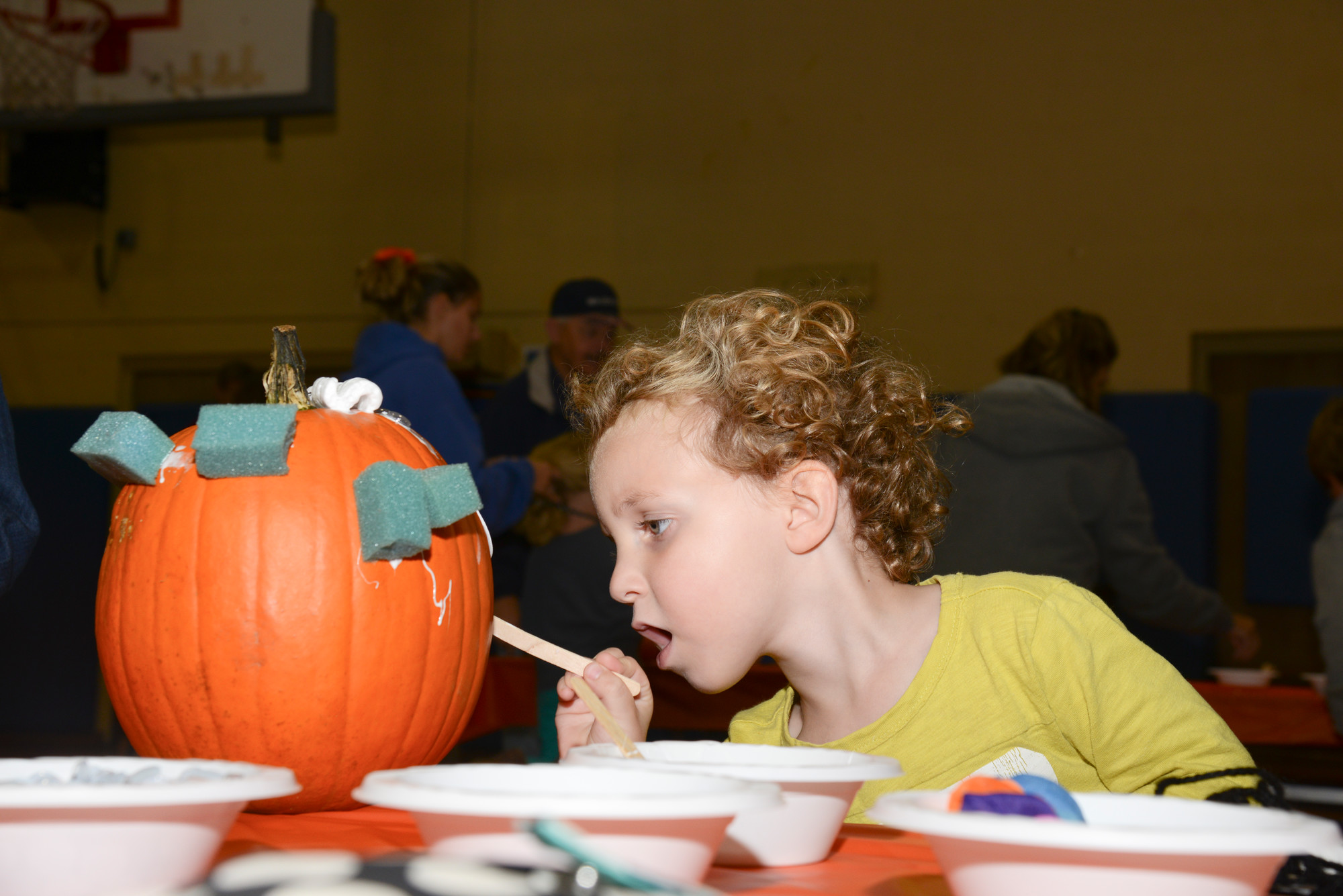 Wyatt Reiss, 3, kept his eyes on his artwork as Oceanside      celebrated October with an event sponsored by the Kiwanis Club and the Department of Community Activities at School No. 6 last Wednesday.
