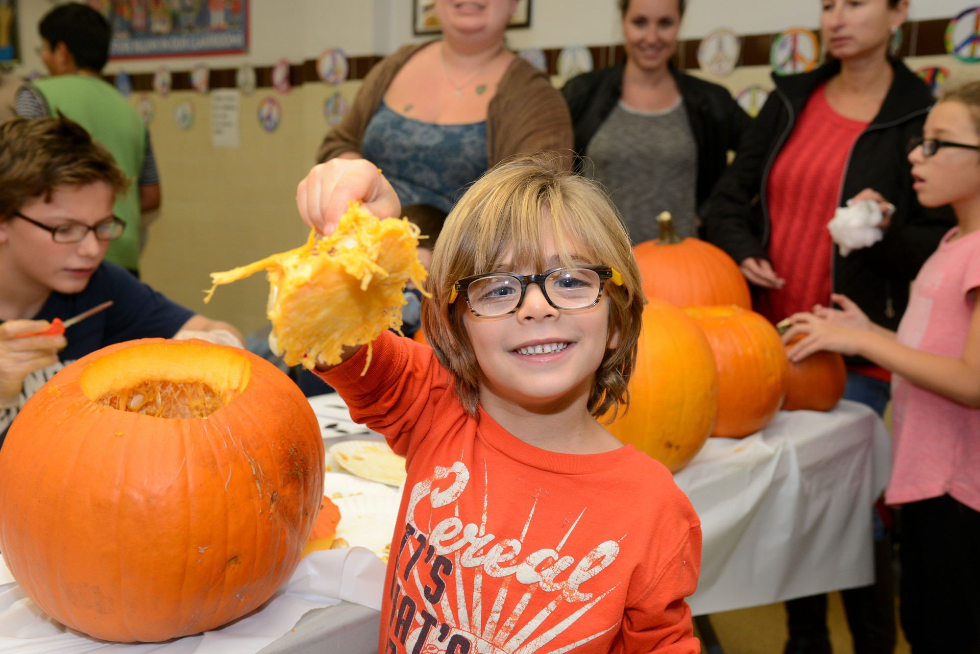 Harley Morgan, 5, knew that the first step in carving a pumpkin is to scalp the pumpkin.