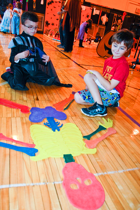 Second-graders Stephen Albano and James DiBona built a skeleton pumpkin.